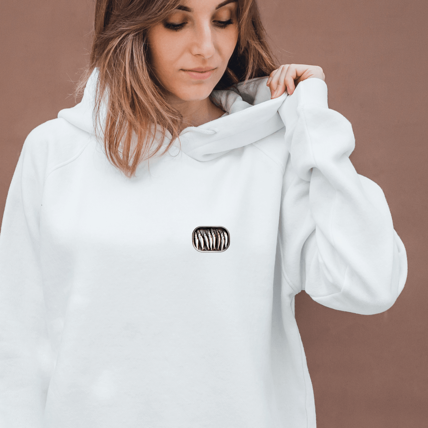 Gildan 18500 hoodie featuring small sardine can, opened, filled with sardines.