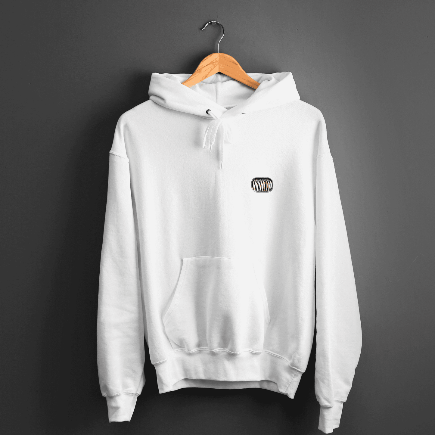 Gildan 18500 hoodie featuring small sardine can, opened, filled with sardines.
