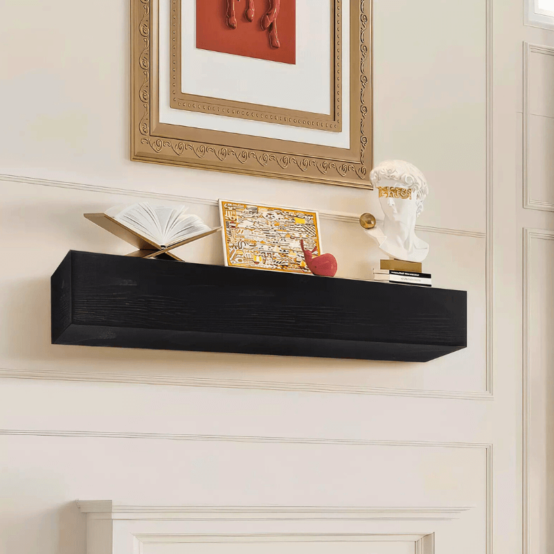 Black distressed mantel slipcover with decorative items elegantly displayed on a wall shelf.