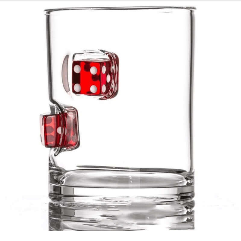 Hand-blown whiskey glass cup featuring embedded red casino dice for a playful drinking experience.