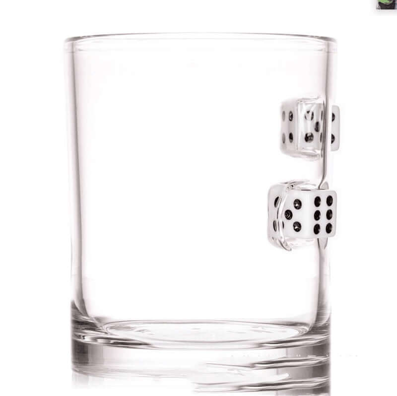 Clear hand blown glass cup with black and white casino dice embedded inside.