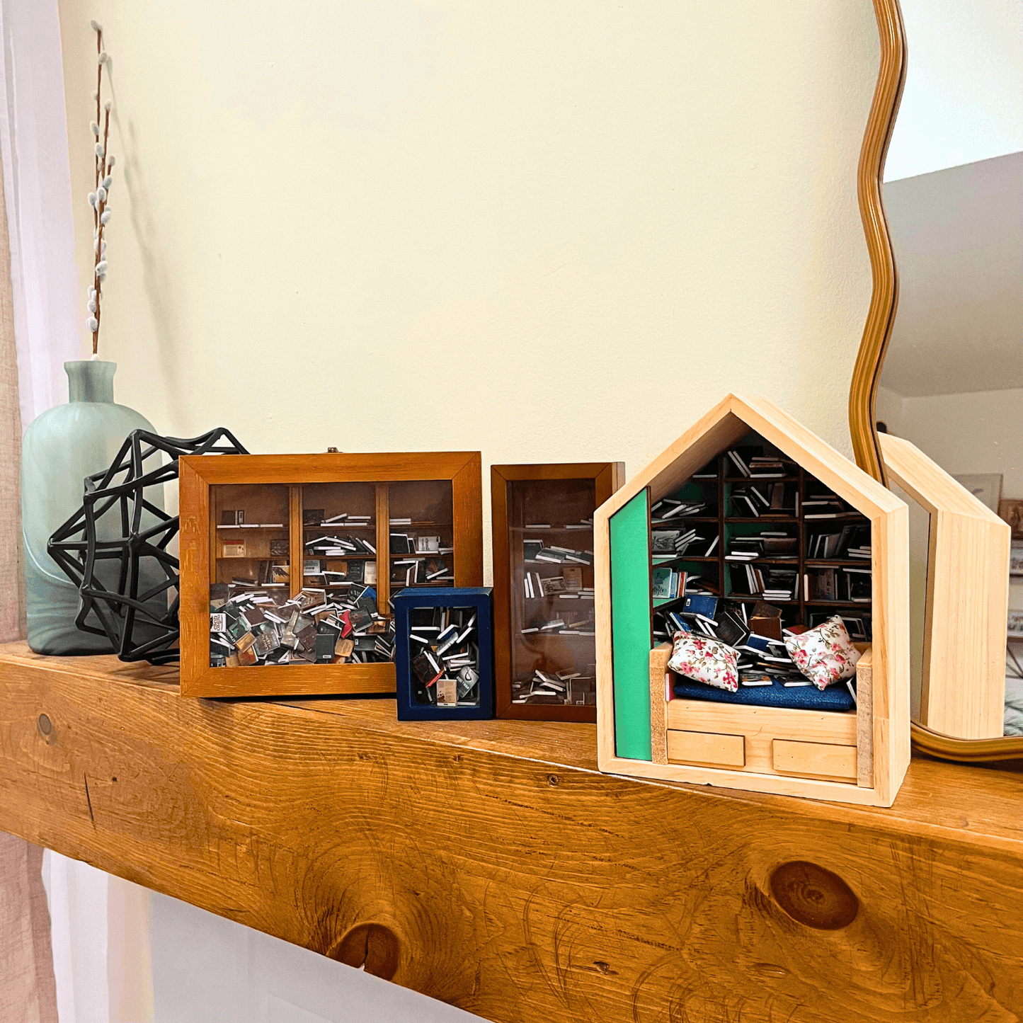 Four Piece Anxiety Bookshelf Collection bundled on a wooden shelf with decorative items.