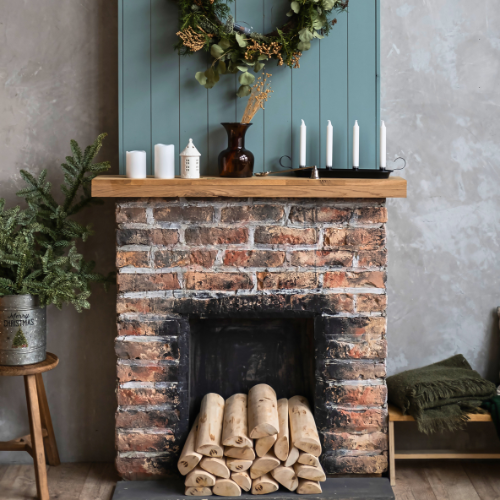 A handmade fireplace mantel slipcover sits over an existing fireplace mantel.