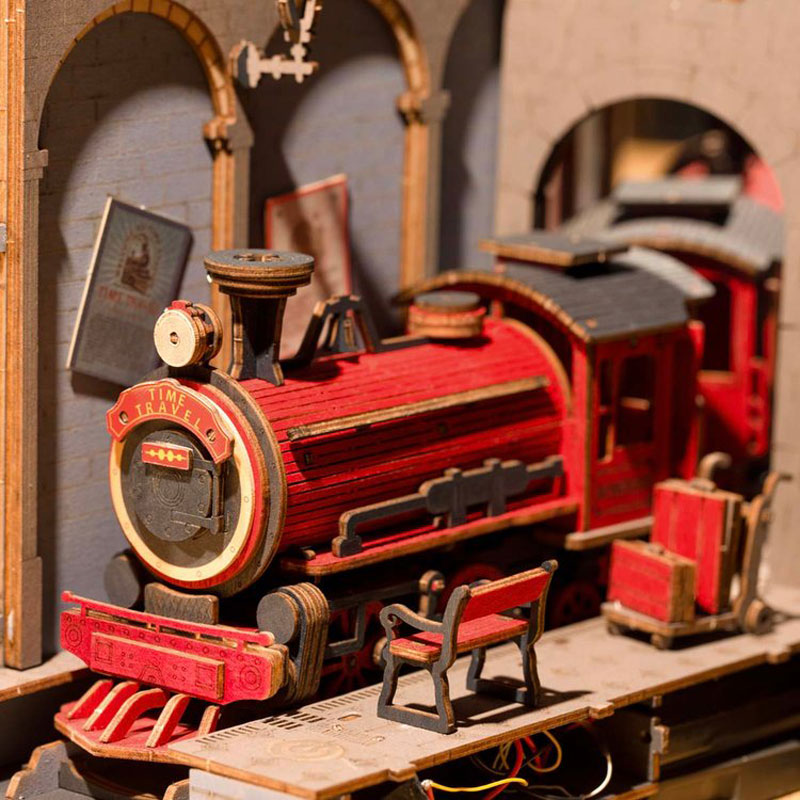 A close up of the miniature train that arrives with your book nook.