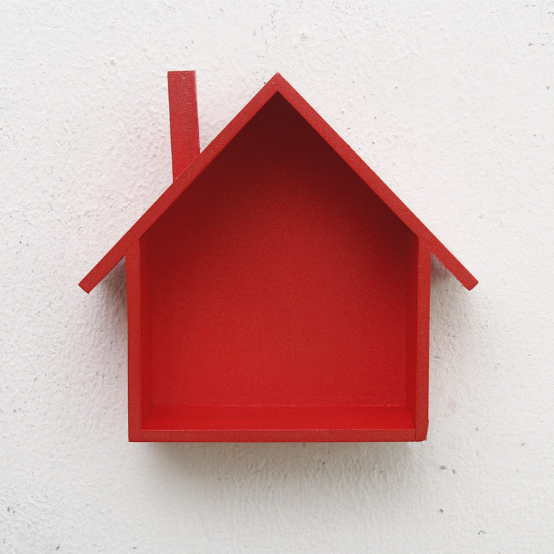 A handmade house shaped floating bookshelf available in green, white, gold, red, pink, and blue.