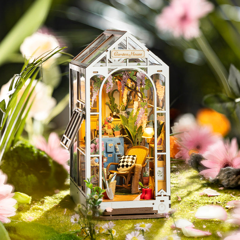 Greenhouse garden book nook. An illuminated DIY book nook that replicates a miniature garden.