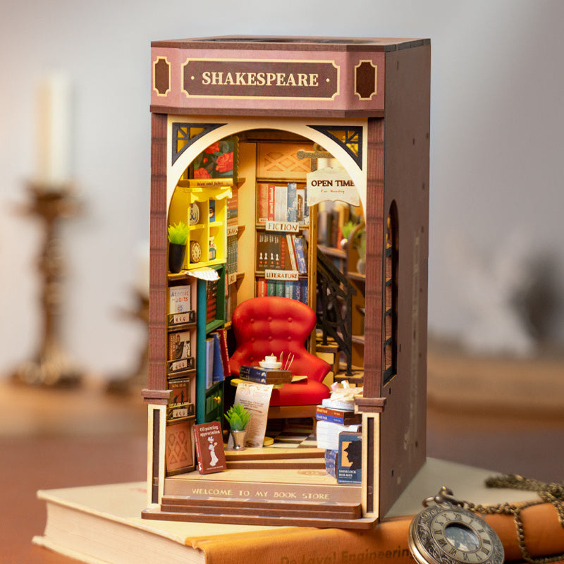 DIY Illuminated Bookstore Book Nook. A mini book store that fits on your bookshelf alongside book.