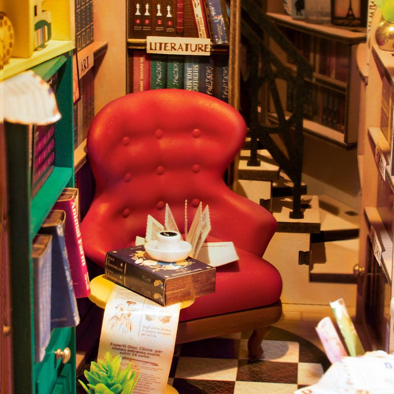 DIY Illuminated Bookstore Book Nook. A mini book store that fits on your bookshelf alongside book.