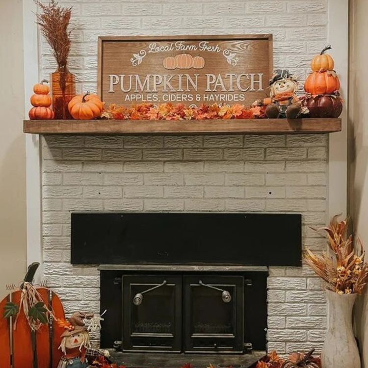 Hand-hewn and distressed stained mantel slipcover with holiday shelf decor.