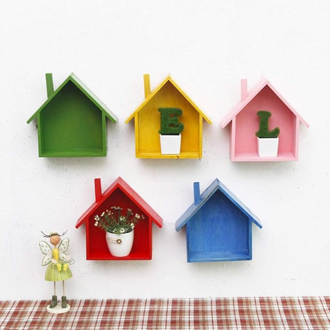 A handmade house shaped floating bookshelf available in green, white, gold, red, pink, and blue.