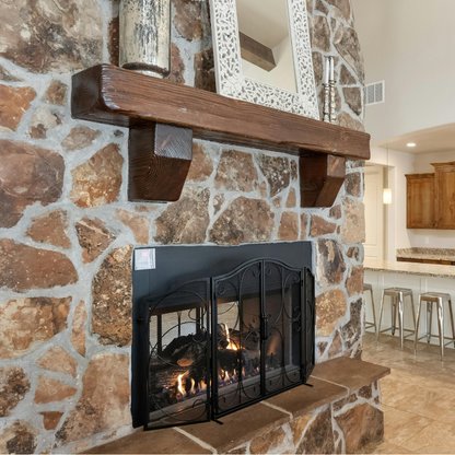 A rustic, hand-distressed, Canadian Made Red Oak fireplace mantel slipcover sits over an existing floating mantel shelf for an instant fireplace update. Stained and finished with protective polyurethane gloss.