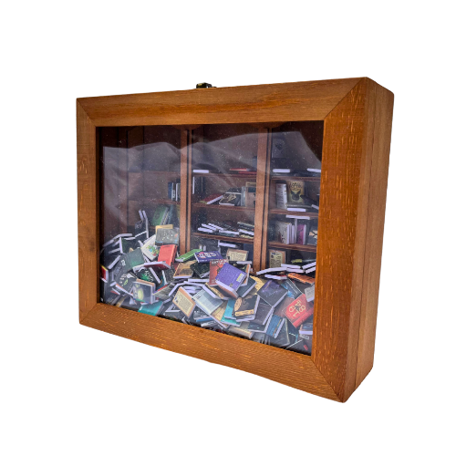 Anxiety Bookshelf mini bookcase with miniature books inside to shake.