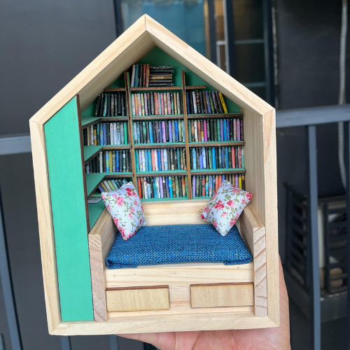 Anxiety Book Room mini book nook filled with the best miniature books. A mini room with a bed, drawers and bookcases to help relieve stress.