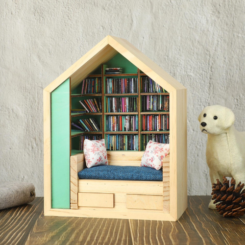 Anxiety Book Room mini book nook filled with the best miniature books. A mini room with a bed, drawers and bookcases to help relieve stress.