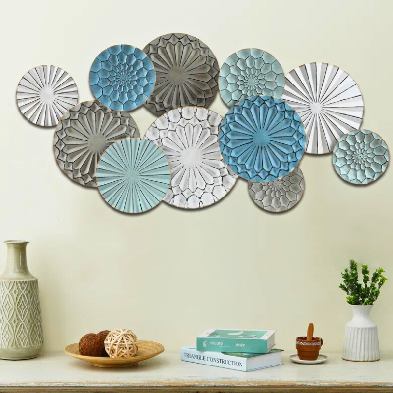 Abstract metal coastal wall decor in turquoise, grey, rustic distressed ocean themed colours.