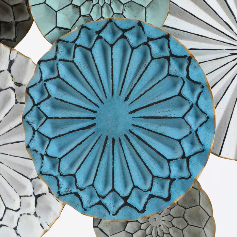 Abstract metal coastal wall decor in turquoise, grey, rustic distressed ocean themed colours.