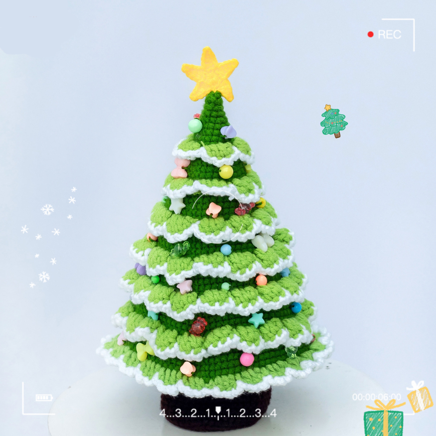 Handmade crochet christmas tree plushie is displayed with a white background.