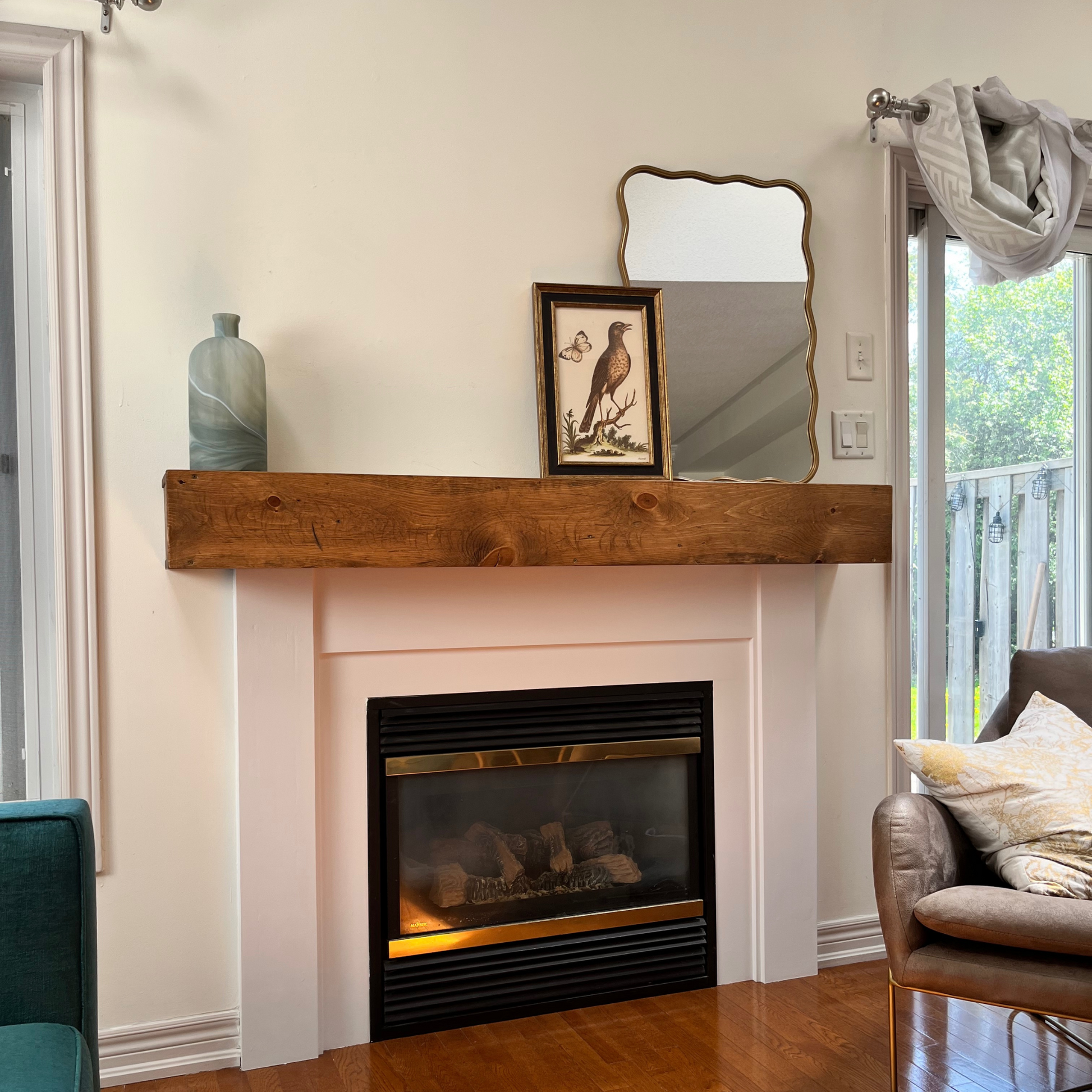 Early American stained handmade floating mantel slipcover is imaged after a fireplace upgrade and renovation.