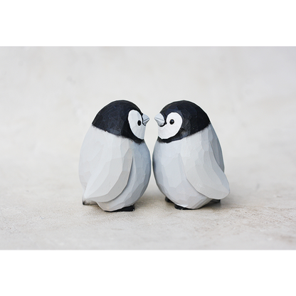 Hand-carved penguin ornaments, unique wooden figurines, perfect gift for penguin lovers.