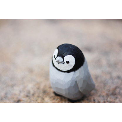 Hand-carved penguin ornaments, unique wooden figurines, perfect gift for penguin lovers.