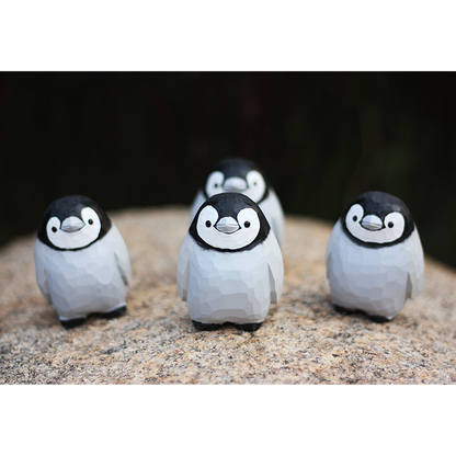 Hand-carved penguin ornaments, unique wooden figurines, perfect gift for penguin lovers.