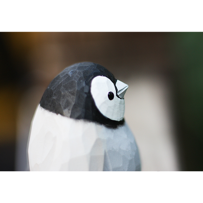 Hand-carved penguin ornaments, unique wooden figurines, perfect gift for penguin lovers.