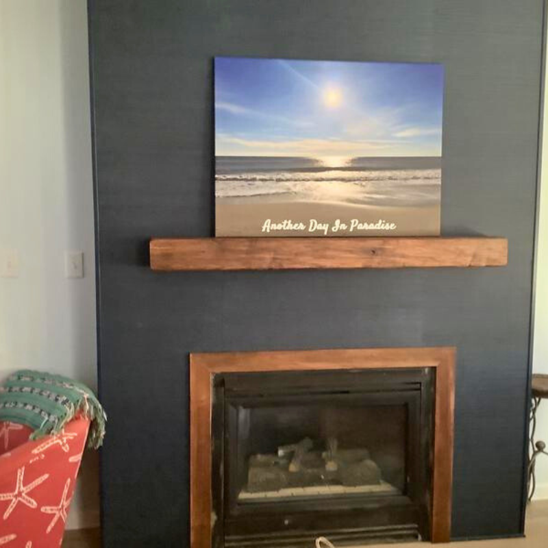 Rustic handmade Canadian Maple fireplace mantel slipcover is displayed.