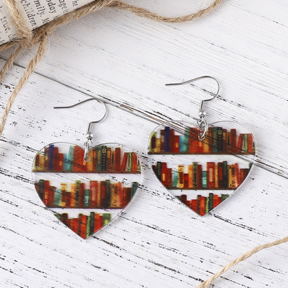 Colourful acrylic mini bookshelf earrings in available teardrop, heart, arch, and circular shapes.