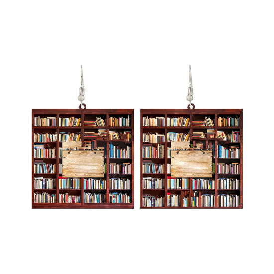 Miniature bookshelf earrings are showcased over a white background.