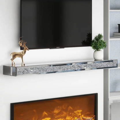 Mirrored glass crystal fireplace mantel with a reflective luxurious frame. For use as a mantel, or luxury floating shelf.