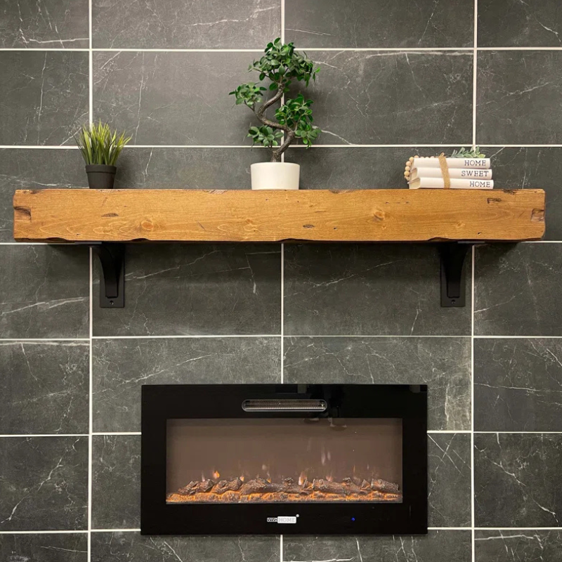 A rustic, hand-distressed, Canadian Made Red Oak fireplace mantel slipcover sits over an existing floating mantel shelf for an instant fireplace update. Stained and finished with protective polyurethane gloss.