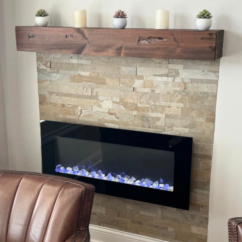 A rustic, hand-distressed, Canadian Made Red Oak fireplace mantel slipcover sits over an existing floating mantel shelf for an instant fireplace update. Stained and finished with protective polyurethane gloss.