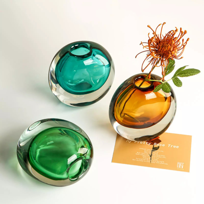 Thick hand blown glass luxury vases, colourful options with amber, green, blue, and black options.