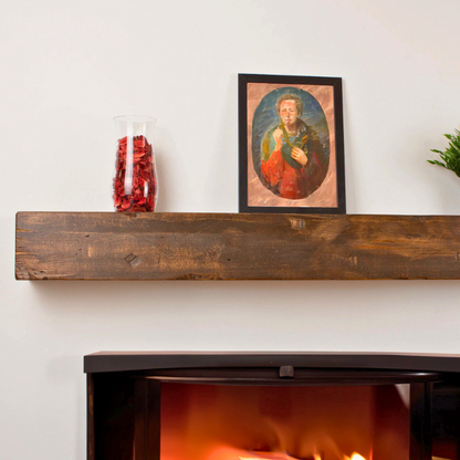 A solid 6x6 cedar wood-stained, lightly distressed floating mantel beam sits over a fireplace.