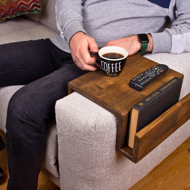 A solid wood handmade stained couch caddy, finished with gloss.  A rustic and truly handmade wooden armrest available in thin and wide options. Multiple sizes and stains are available, the standard size is shown.