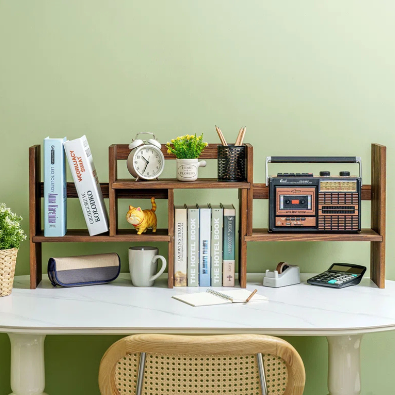 A unique desktop bookshelf. Three-piece, corner and side stackable burnt and stained wood desk organizer. Handmade from sustainable materials, and ships for free.