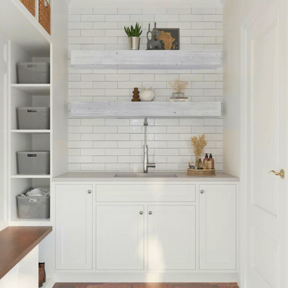 A white mantel slipcover is displayed. This floating shelf fireplace mantel is whitewashed for a rustic and distressed look. Handmade from natural Alderwood.