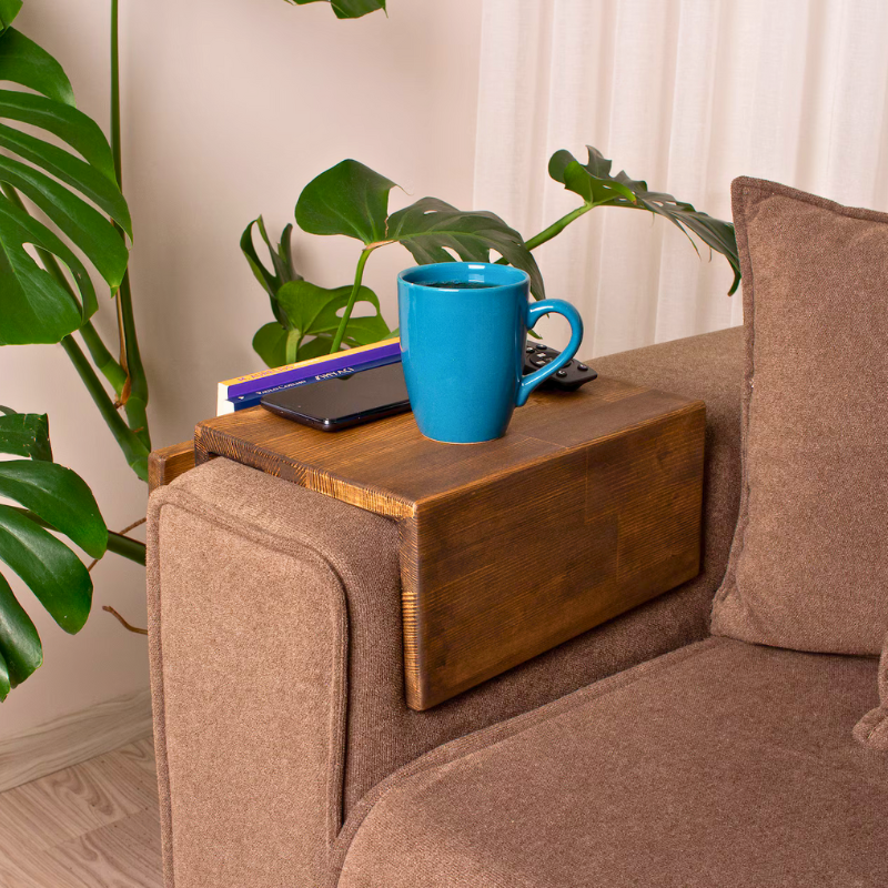 A solid wood handmade stained couch caddy, finished with gloss.  A rustic and truly handmade wooden armrest available in thin and wide options. Multiple sizes and stains are available, the standard size is shown.