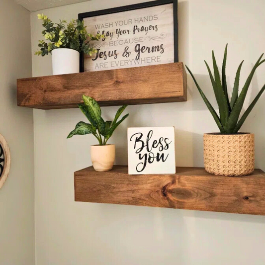 A Set of Rustic handmade stained red oak wood box floating shelves. Custom stains and sizes are available. Large faced floating shelves with flat face showcasing the wood grain.