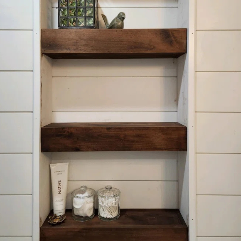 A Set of Rustic handmade stained red oak wood box floating shelves. Custom stains and sizes are available. Large faced floating shelves with flat face showcasing the wood grain.