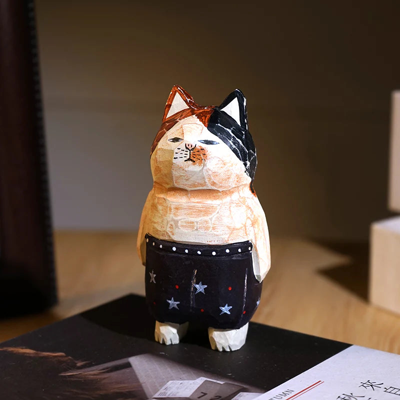 Hand carved cat ornaments stand on their hind legs and face the camera. The cutest gifts for cat lovers and cat ladies.