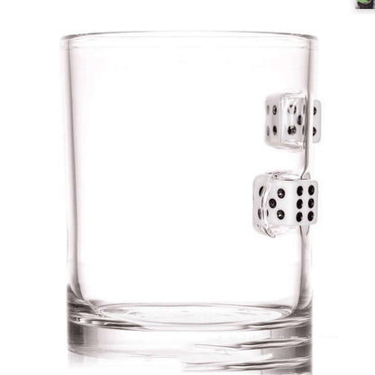 Clear hand blown glass cup with black and white casino dice embedded inside.