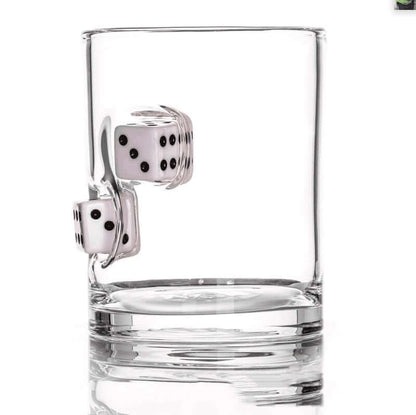 Hand blown glass cup featuring embedded black and white casino dice, perfect for whiskey lovers.