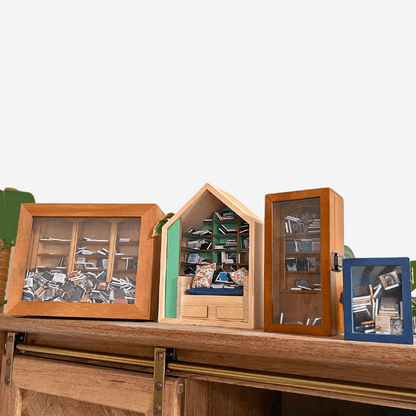 Four Piece Anxiety Bookshelf Collection Bundle showcasing colorful miniature bookshelves filled with tiny books.
