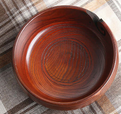 Handmade wood crochet yarn bowl with a smooth finish, perfect for crafters to prevent yarn tangles.