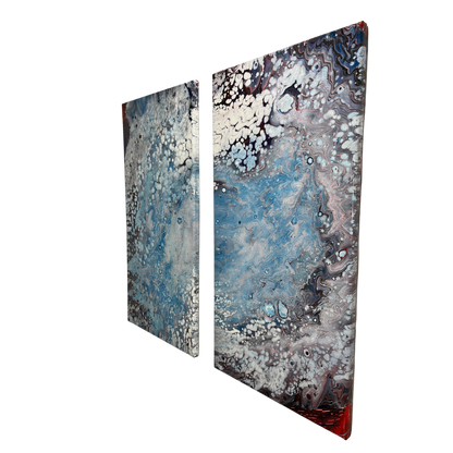 fluid art pour painting diptych that resembles a hurricane 