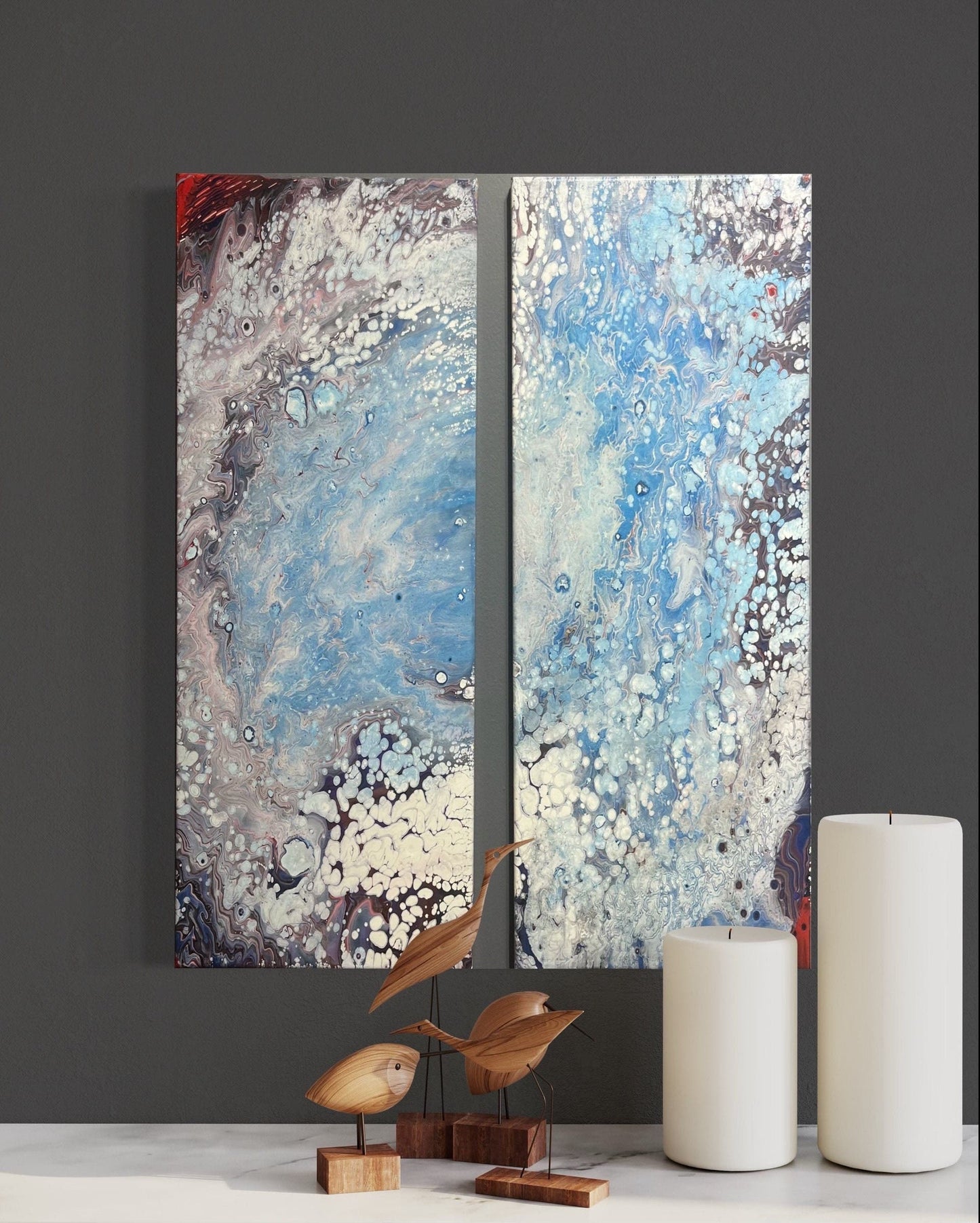 fluid art pour painting diptych that resembles a hurricane 