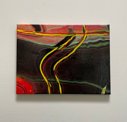 abstract fluid art featuring a black background, with yellow, red and green flowing lines