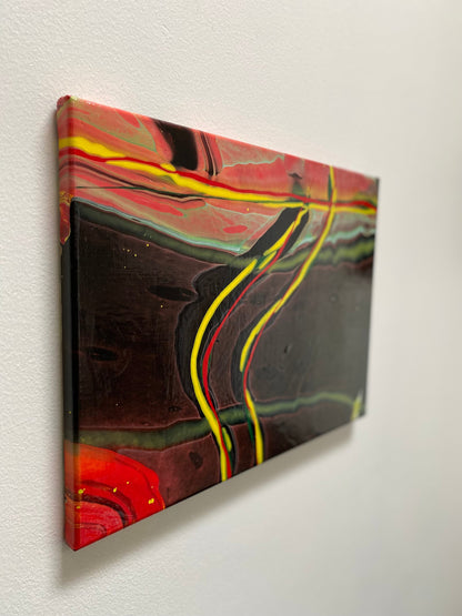 abstract fluid art featuring a black background, with yellow, red and green flowing lines