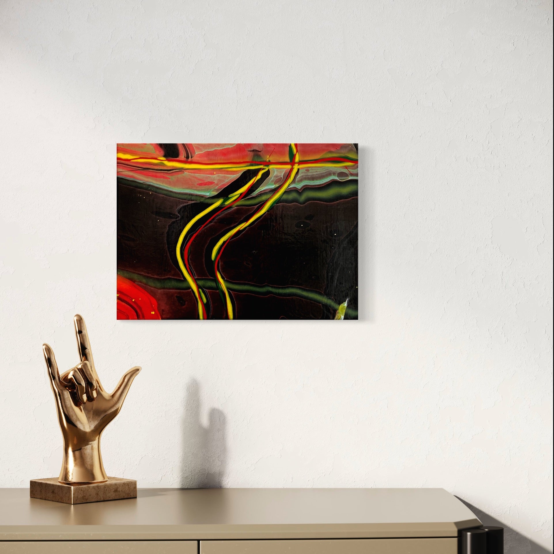 abstract fluid art featuring a black background, with yellow, red and green flowing lines